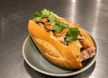 Roast pork bánh mì with crackling and fresh coriander