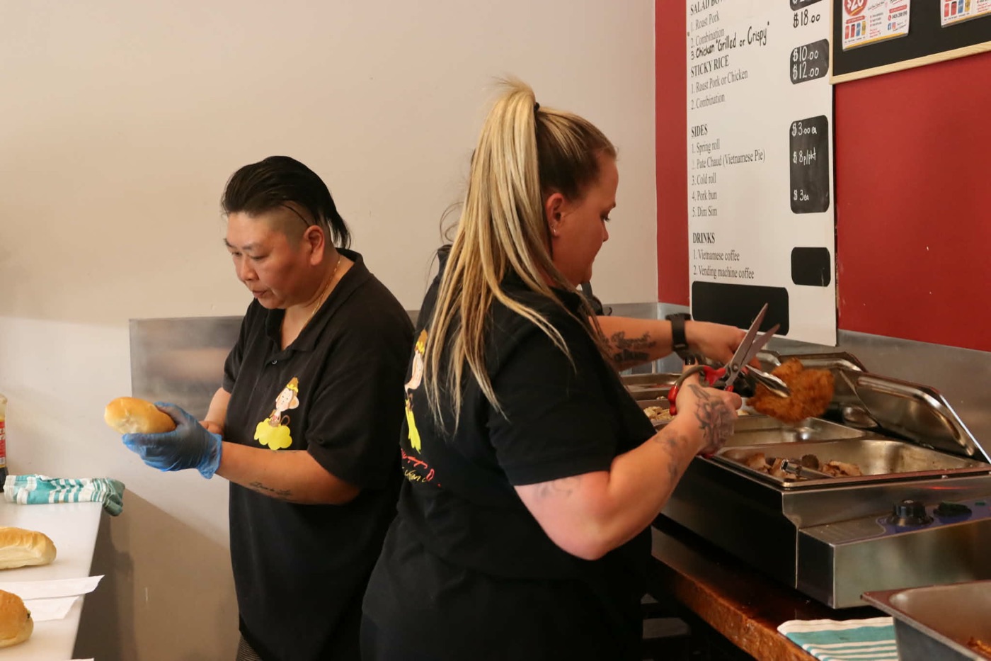 Shandy and Lisa preparing orders behind the counter at Asian Tucker in Tanunda