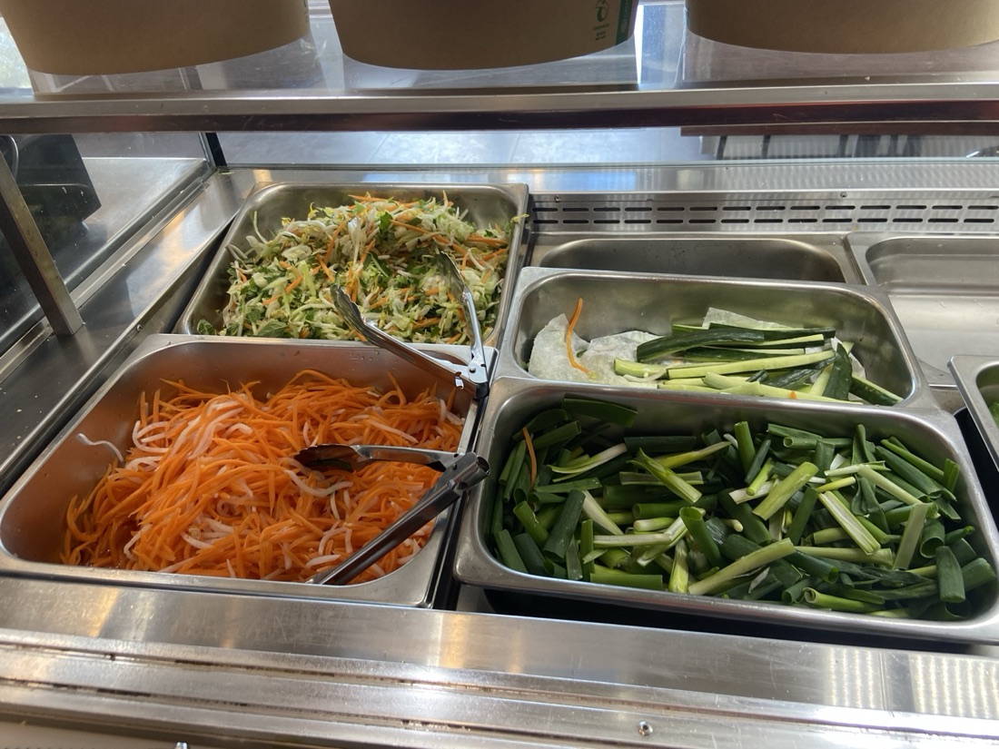 Trays of shredded carrot, cucumber and fresh greens prepared at the Asian Tucker salad bar in Tanunda